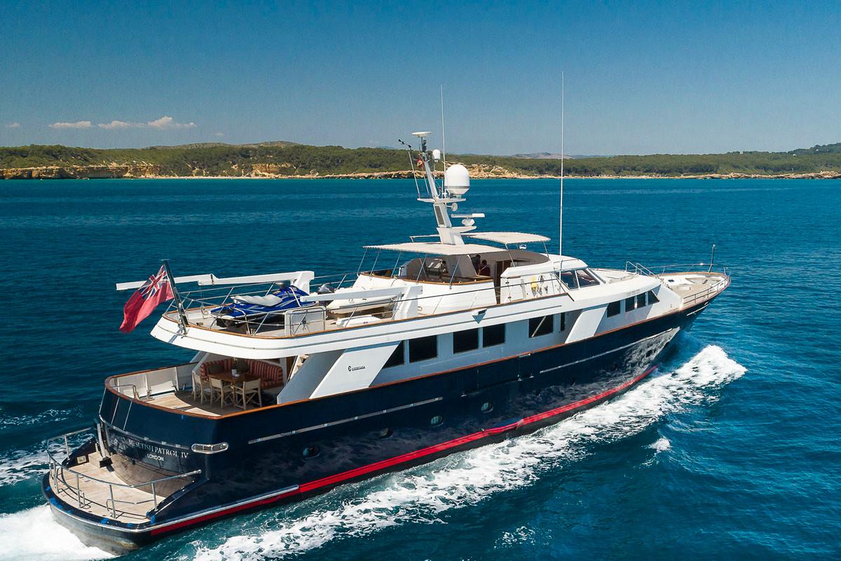 1988 Codecasa Displacement yacht cruising on blue ocean waters.