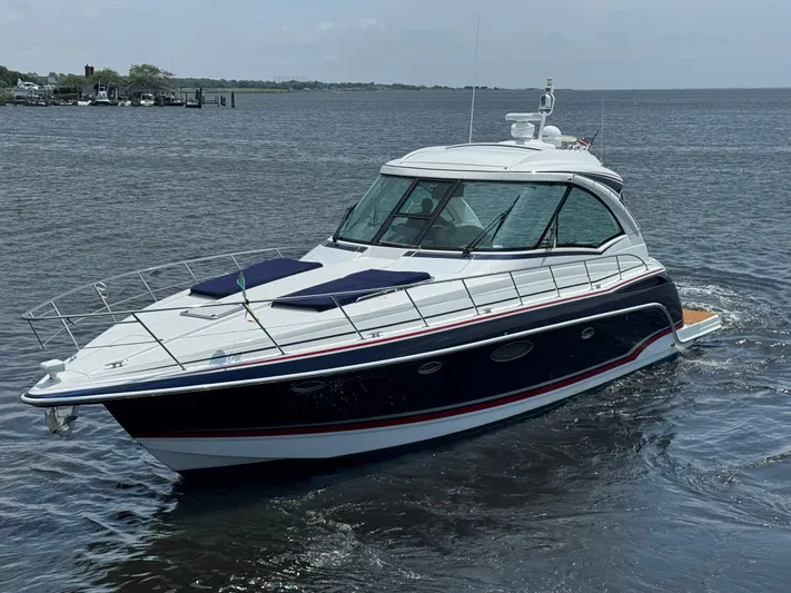  Yacht Photos Pics 2013 Formula 45 Yacht cruising on calm waters, showcasing sleek design and luxury features.