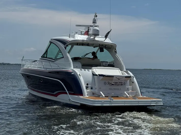  Yacht Photos Pics 2013 Formula 45 Yacht cruising on open water under a clear sky.