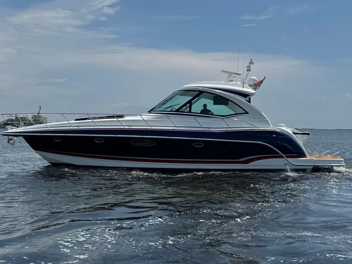  Yacht Photos Pics 2013 Formula 45 Yacht cruising on open water under a clear sky.