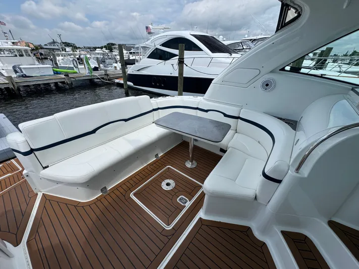  Yacht Photos Pics Luxurious 2013 Formula 45 Yacht with elegant seating and sleek design at a marina.