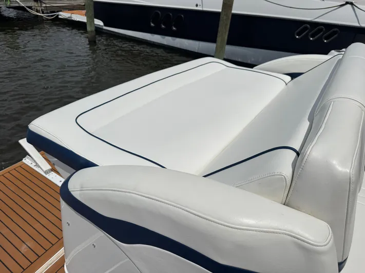  Yacht Photos Pics Luxury seating on a 2013 Formula 45 Yacht, docked by the water.