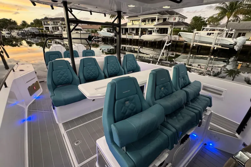  Yacht Photos Pics 2021 Axopar 37 Sun Top boat interior with luxurious seating and ambient lighting.