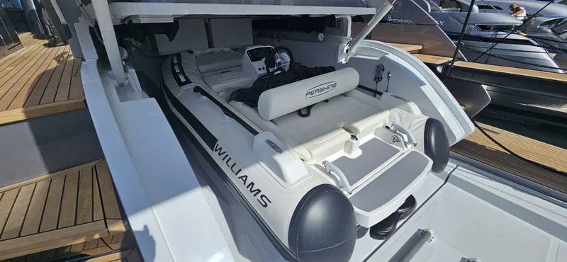 Ciao Yacht Photos Pics 2024 Pershing 7X yacht with Williams tender in storage compartment.