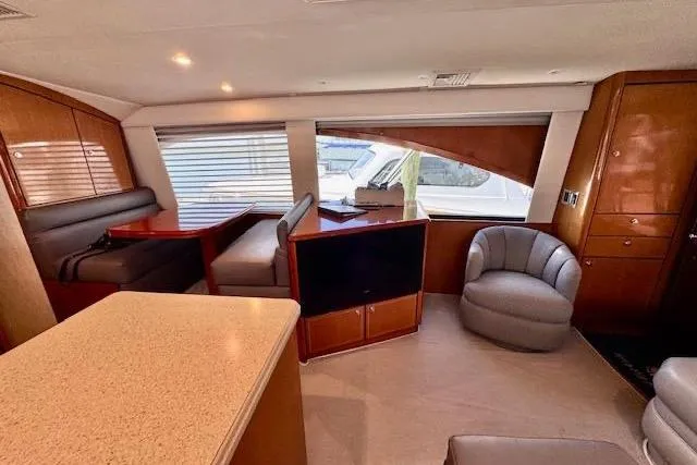 Pipe Dream Yacht Photos Pics Luxurious interior of 2005 Ocean Yachts 50 Super Sport with modern seating and entertainment area.