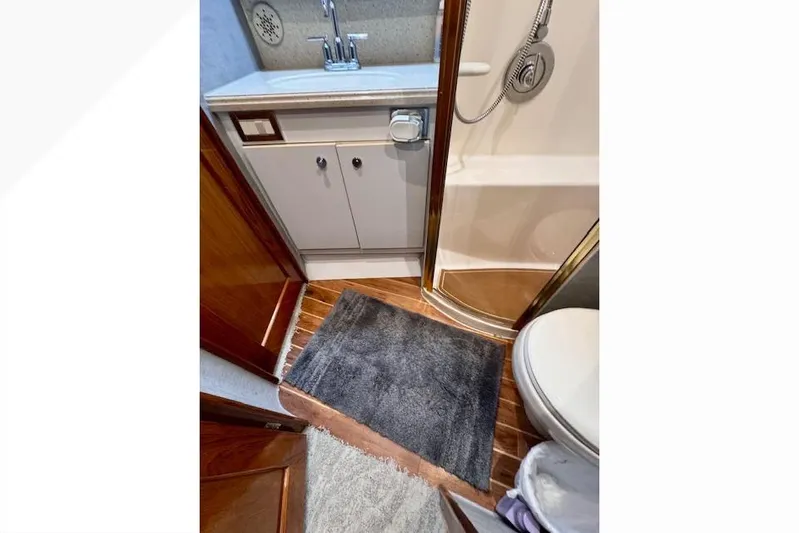 Pipe Dream Yacht Photos Pics Bathroom interior of 2005 Ocean Yachts 50 Super Sport with shower and sink.