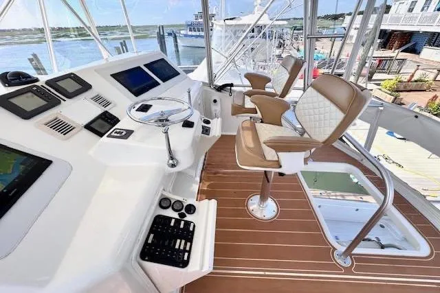Pipe Dream Yacht Photos Pics Helm of 2005 Ocean Yachts 50 Super Sport with modern controls and seating.
