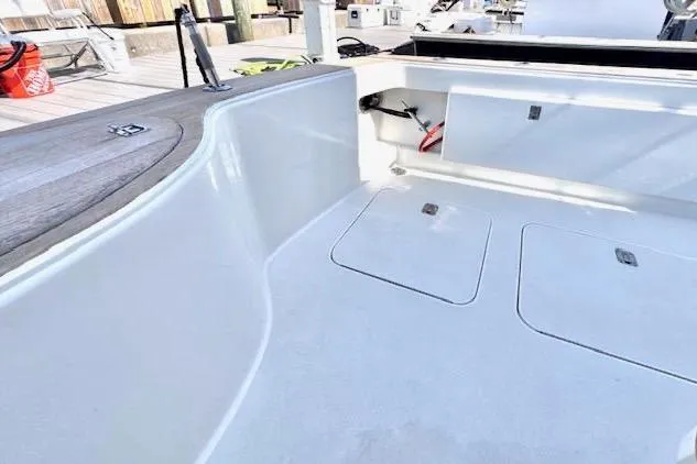 Pipe Dream Yacht Photos Pics 2005 Ocean Yachts 50 Super Sport boat deck with storage compartments.