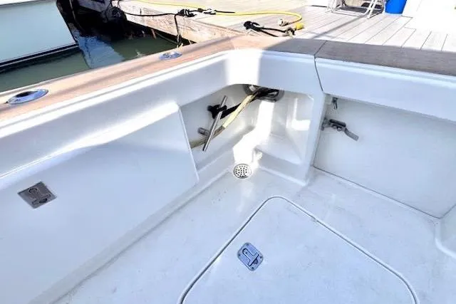 Pipe Dream Yacht Photos Pics 2005 Ocean Yachts 50 Super Sport boat deck with storage compartments.