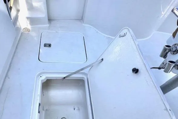 Pipe Dream Yacht Photos Pics 2005 Ocean Yachts 50 Super Sport deck with open storage compartments.