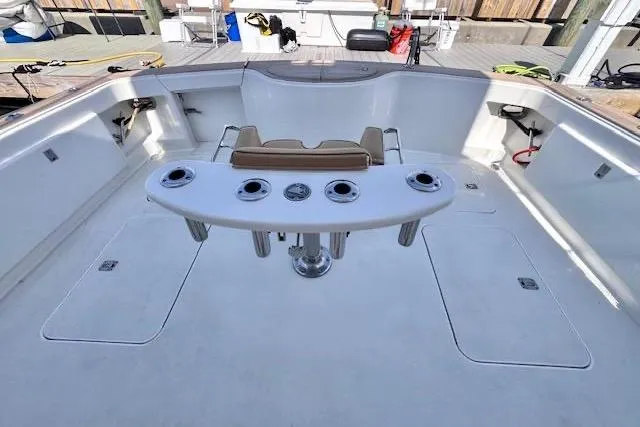 Pipe Dream Yacht Photos Pics 2005 Ocean Yachts 50 Super Sport fishing deck with rod holders and seating.