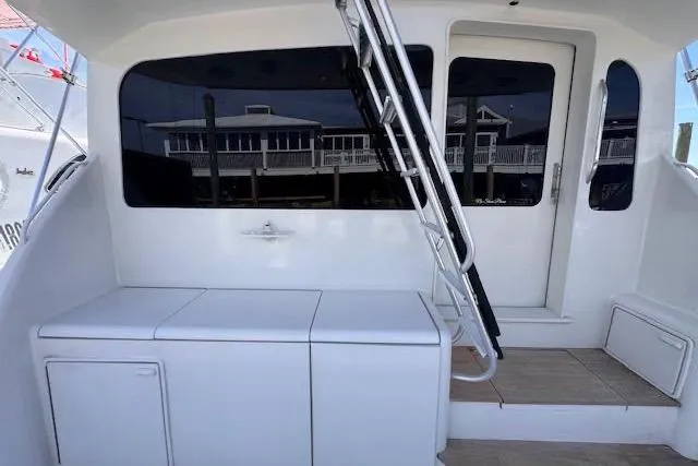 Pipe Dream Yacht Photos Pics 2005 Ocean Yachts 50 Super Sport yacht deck with stairs and storage compartments.