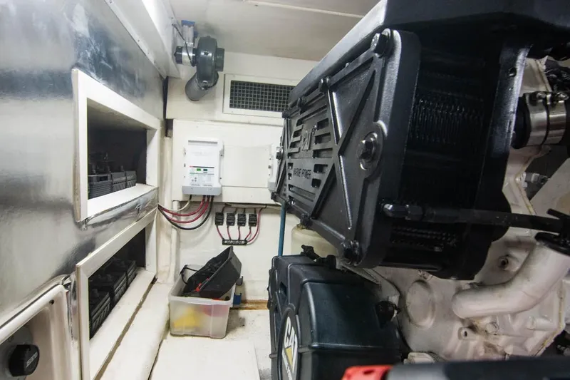 Pipe Dream Yacht Photos Pics Engine room of 2005 Ocean Yachts 50 Super Sport, featuring mechanical components and wiring.