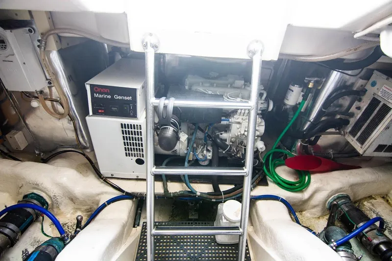 Pipe Dream Yacht Photos Pics Engine room of 2005 Ocean Yachts 50 Super Sport with Onan Marine Genset.