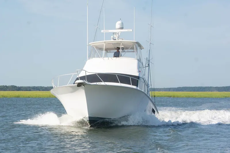 Pipe Dream Yacht Photos Pics 2005 Ocean Yachts 50 Super Sport cruising on open water.