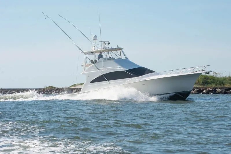 Pipe Dream Yacht Photos Pics 2005 Ocean Yachts 50 Super Sport cruising on open water.