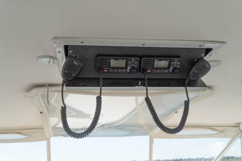 Pipe Dream Yacht Photos Pics 2005 Ocean Yachts 50 Super Sport communication radios and microphones on the control panel.