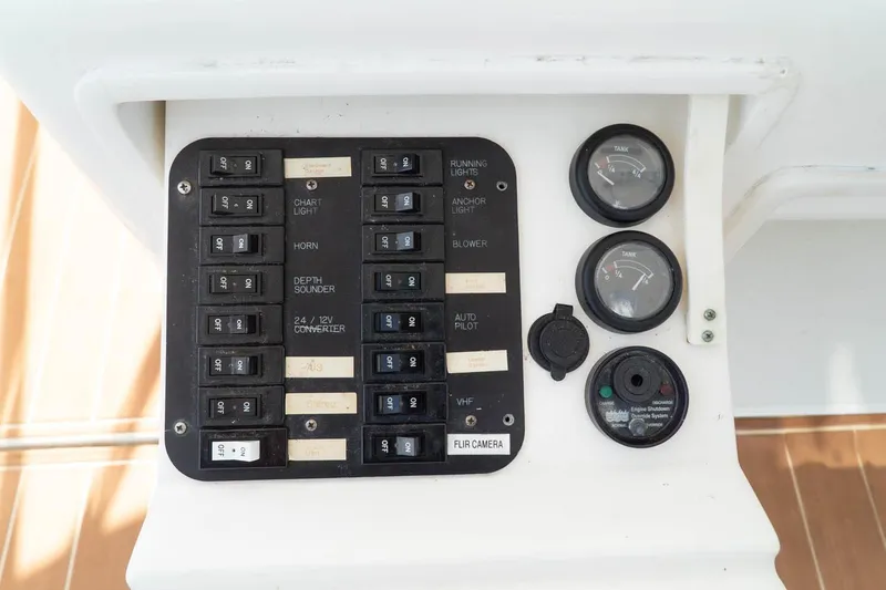 Pipe Dream Yacht Photos Pics Control panel of a 2005 Ocean Yachts 50 Super Sport with switches and gauges.