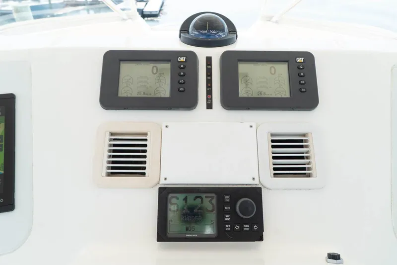 Pipe Dream Yacht Photos Pics Control panel of a 2005 Ocean Yachts 50 Super Sport with navigation instruments.