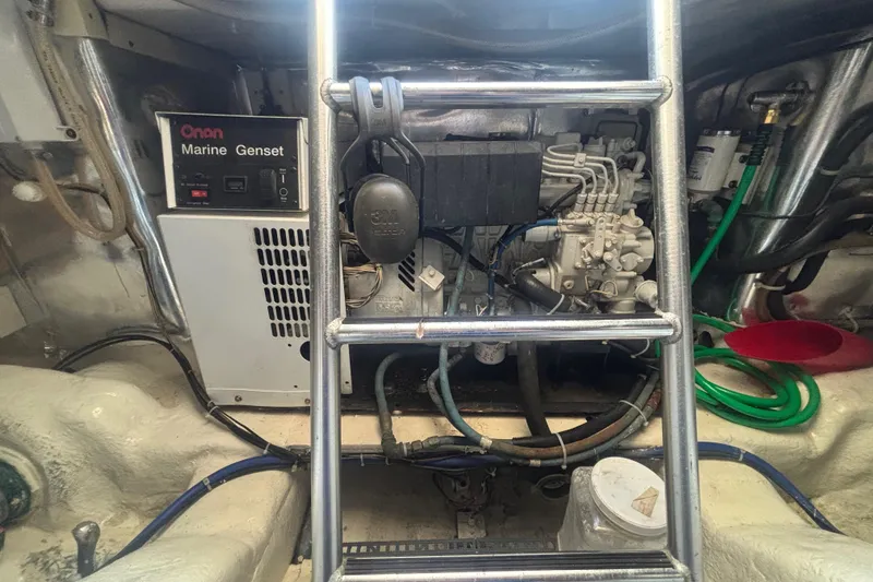 Pipe Dream Yacht Photos Pics Engine room of 2005 Ocean Yachts 50 Super Sport with Onan Marine Genset.