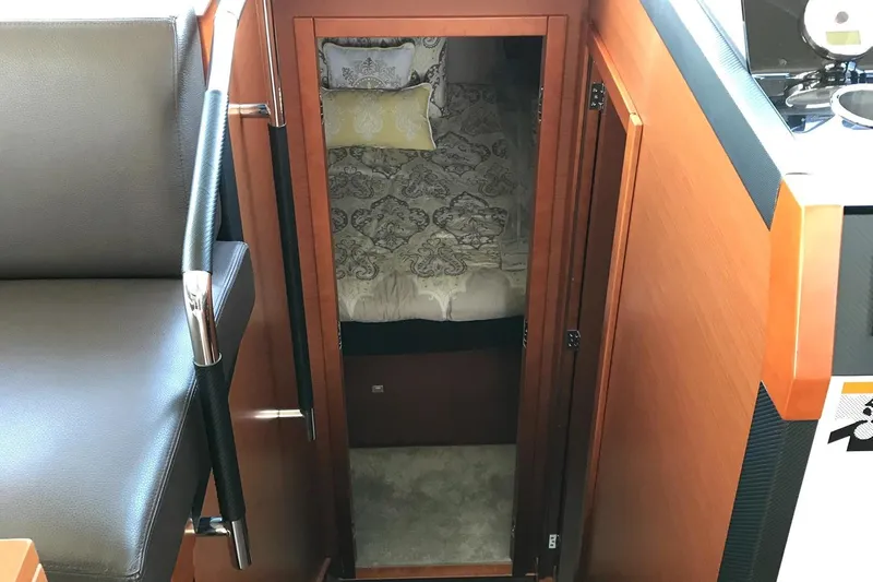  Yacht Photos Pics Interior of 2017 Prestige 420S Coupé yacht, featuring a cozy cabin entrance.