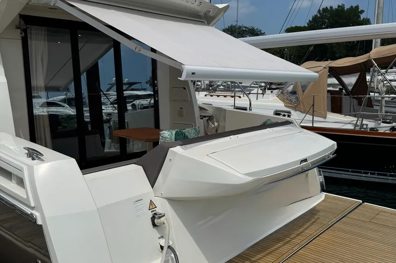  Yacht Photos Pics Luxury 2017 Prestige 420S Coupé yacht with retractable awning and elegant deck area.