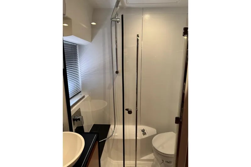  Yacht Photos Pics Modern bathroom in 2017 Prestige 420S Coupé yacht with shower and toilet.