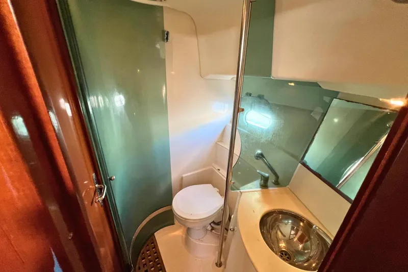  Yacht Photos Pics Bathroom interior of 2005 Jeanneau Prestige 36 yacht with shower and sink.
