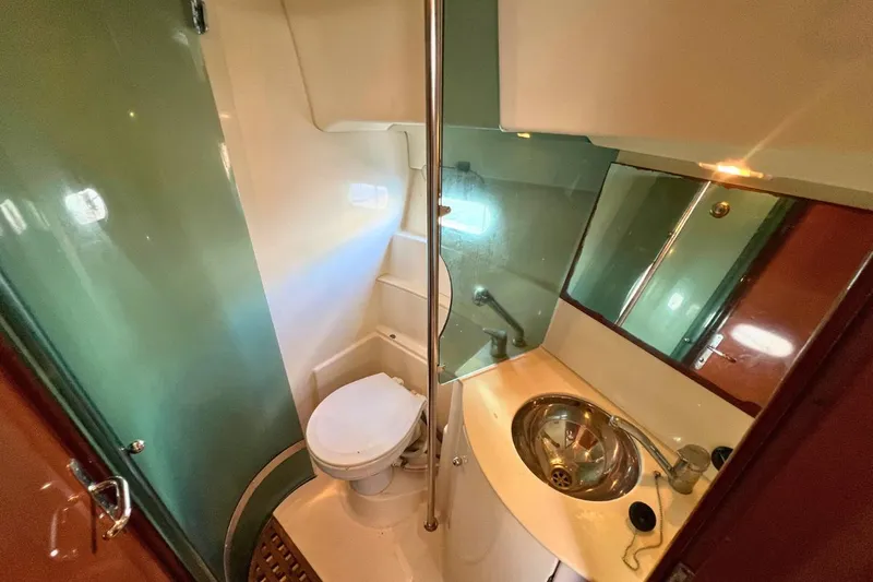  Yacht Photos Pics Bathroom interior of 2005 Jeanneau Prestige 36 yacht with toilet and sink.