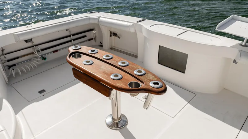 Life Of Reilly 2.0 Yacht Photos Pics 2012 Cabo 44 HTX boat deck with rod holders and ocean view.