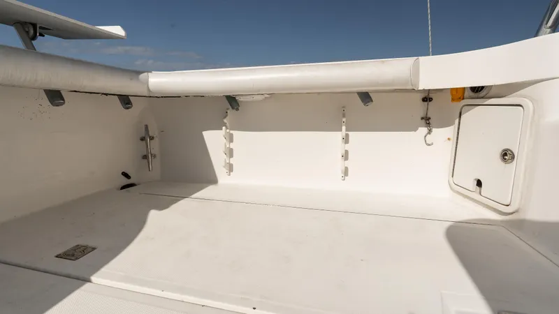 Life Of Reilly 2.0 Yacht Photos Pics 2012 Cabo 44 HTX boat deck, spacious and clean, with storage compartments.