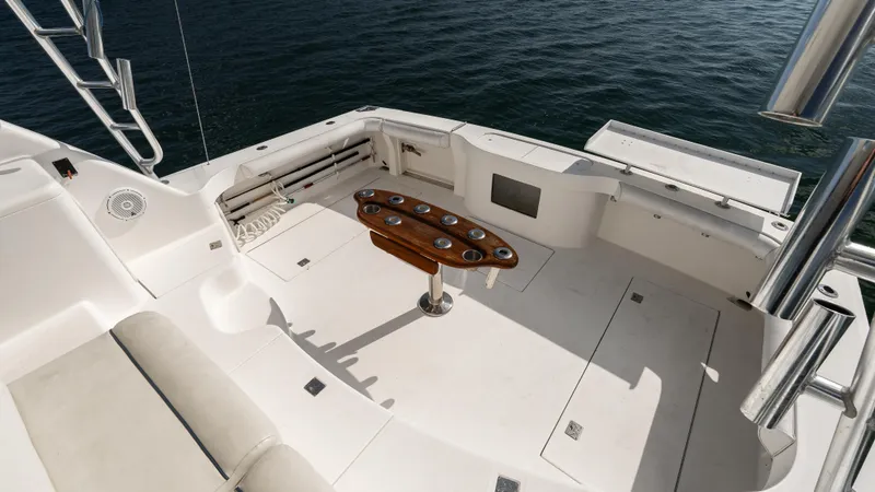 Life Of Reilly 2.0 Yacht Photos Pics Spacious deck of 2012 Cabo 44 HTX yacht with seating and rod holders.