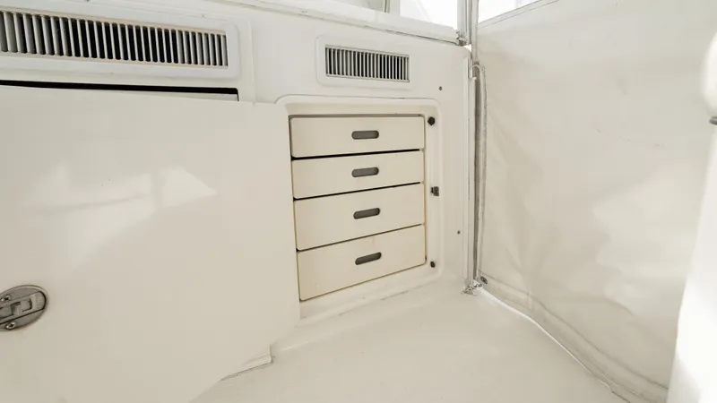 Life Of Reilly 2.0 Yacht Photos Pics Interior storage drawers on a 2012 Cabo 44 HTX boat.