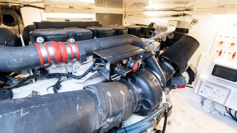 Life Of Reilly 2.0 Yacht Photos Pics Engine room of 2012 Cabo 44 HTX yacht, showcasing detailed machinery and components.