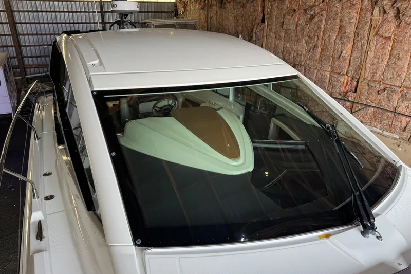  Yacht Photos Pics 2016 Beneteau Gran Turismo 40 yacht in storage, showcasing sleek design and windshield.