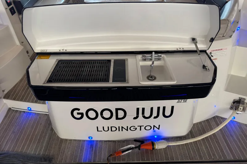  Yacht Photos Pics Beneteau Gran Turismo 40, 2016 model, featuring outdoor kitchen with grill and sink.