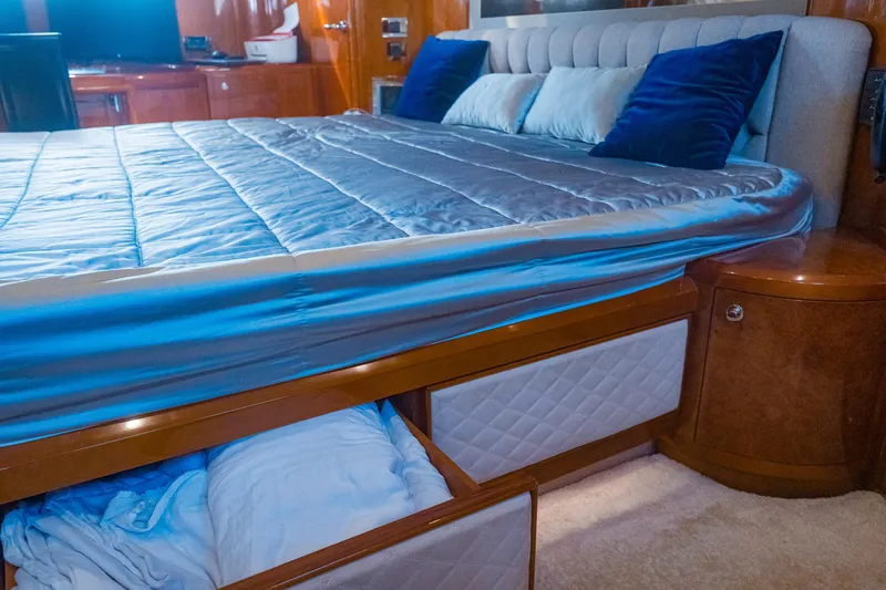 Odeya Yacht Photos Pics Luxurious bedroom interior of 2004 Princess 82 Motor Yacht with storage drawers.