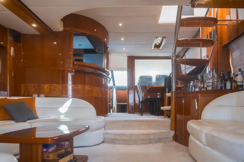 Odeya Yacht Photos Pics Luxurious interior of 2004 Princess 82 Motor Yacht with elegant seating and wooden finishes.