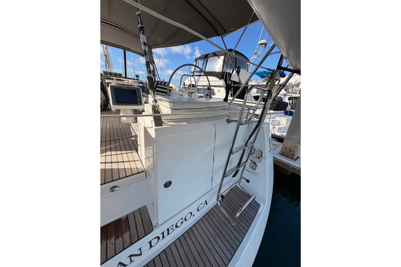 Set Free Yacht Photos Pics 2007 Beneteau 49 yacht docked in San Diego, featuring a sleek deck and helm.