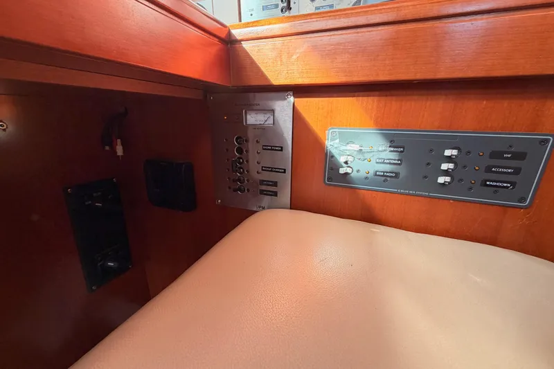 Set Free Yacht Photos Pics Control panel inside a 2007 Beneteau 49 yacht, featuring various switches and indicators.