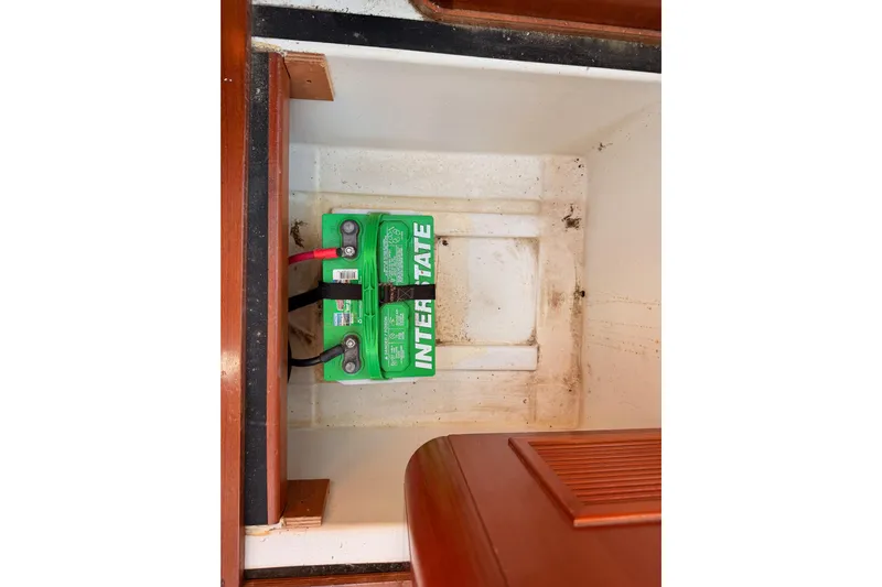 Set Free Yacht Photos Pics Battery compartment of a 2007 Beneteau 49 sailboat with Interstate battery.