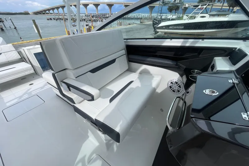  Yacht Photos Pics 2022 Blackfin 272 DC boat interior with sleek seating and modern dashboard.