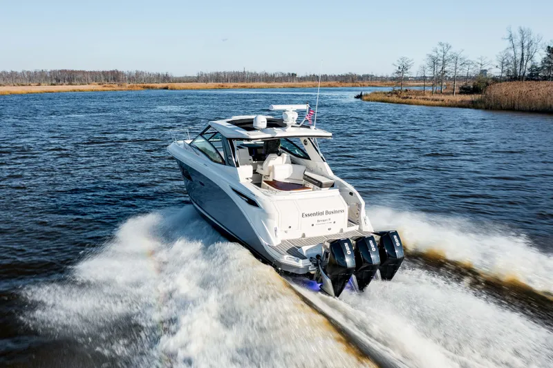  Yacht Photos Pics 2019 Sea Ray 320 Sundancer OB cruising on a lake.
