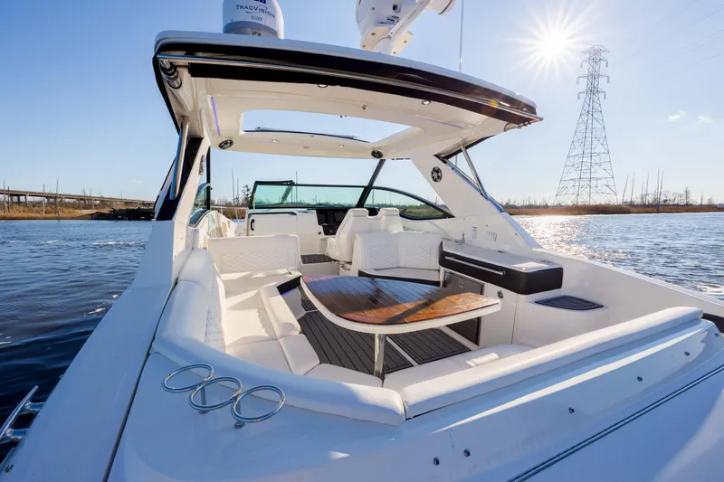  Yacht Photos Pics 2019 Sea Ray 320 Sundancer OB boat with spacious deck and seating area.