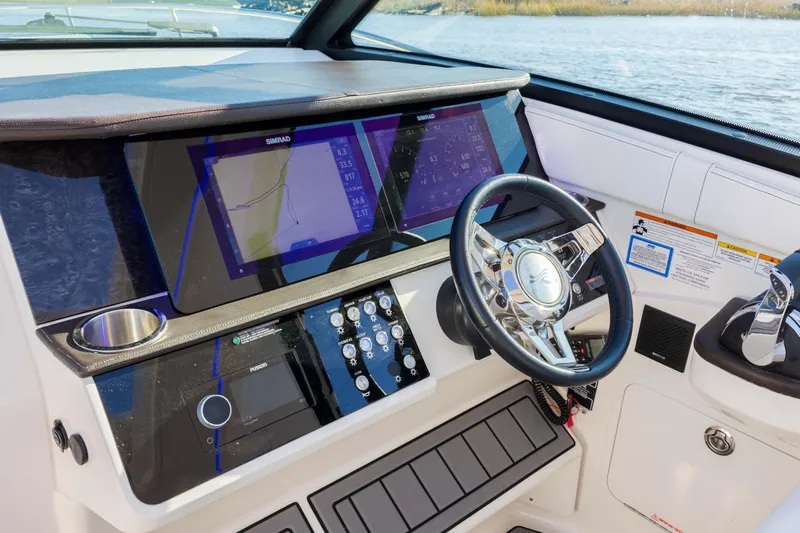  Yacht Photos Pics 2019 Sea Ray 320 Sundancer OB helm with dual navigation screens and steering wheel.