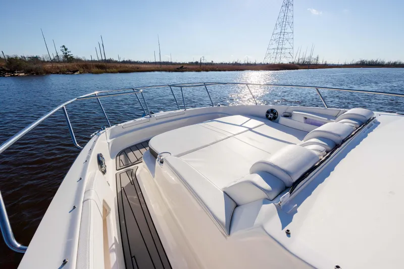  Yacht Photos Pics 2019 Sea Ray 320 Sundancer OB boat on calm water with sunpad and railing.