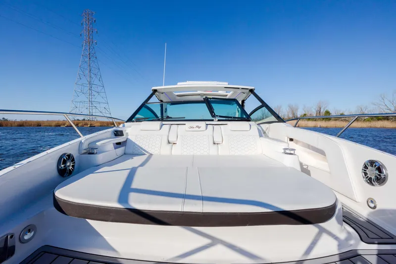 Yacht Photos Pics 2019 Sea Ray 320 Sundancer OB boat with spacious deck and seating area.