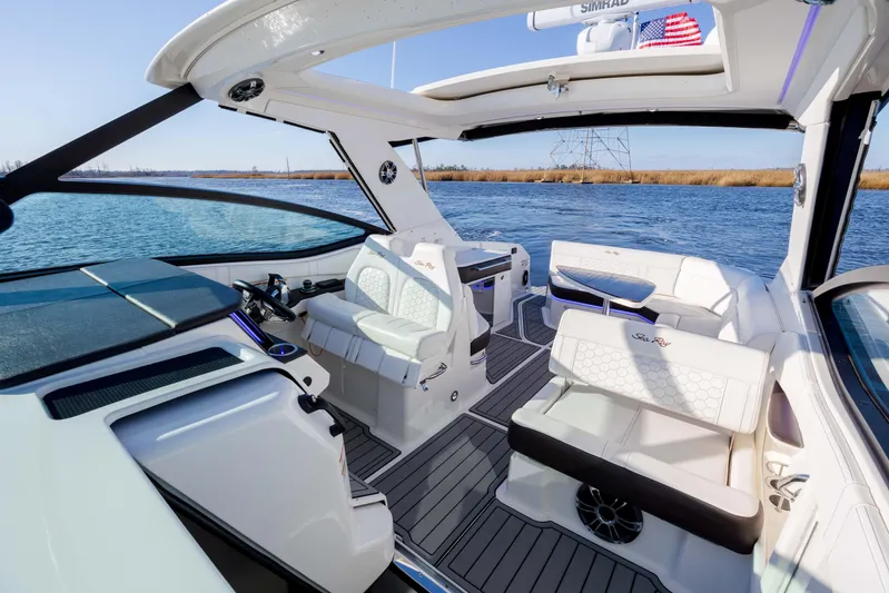  Yacht Photos Pics 2019 Sea Ray 320 Sundancer OB interior with luxurious seating and open water view.