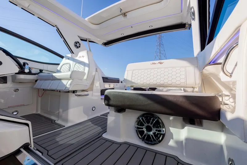  Yacht Photos Pics 2019 Sea Ray 320 Sundancer OB interior with seating and open roof.