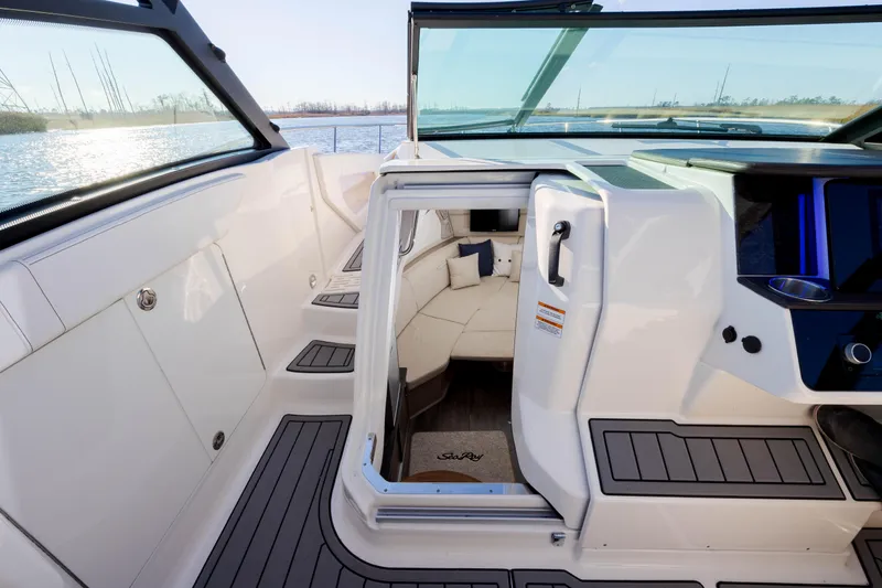  Yacht Photos Pics 2019 Sea Ray 320 Sundancer OB interior cabin view with open door.